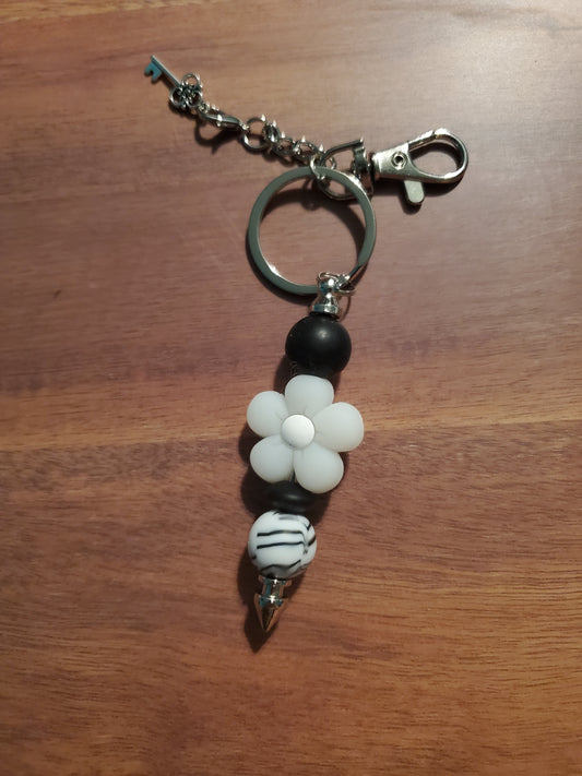 White and black flower beaded keychain